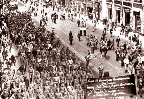 Street demonstration, Petrograd, 18 June 1917. The banner in the foreground reads "Down With The 10 Capitalist Ministers/ All Power To The Soviets Of Workers', Soldiers', And Peasants' Deputies/ And To The Socialist Ministers/ [We Demand That Nicholas II Be Transfered To The Peter-Paul Fortress."