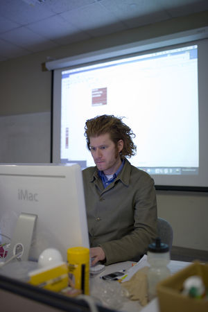 Teacher concentrating on computer screen.jpg