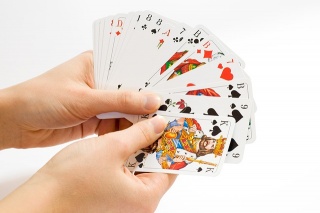 Hand of cards white background.jpg