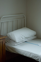 A prepared bed in the ward without a patient occupying it,Image provided by Courtesy of Flickr.www.fiickr.com