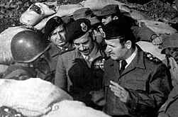 President Hafez al-Assad of Syria (right) with soldiers, 1973.
