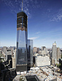 One World Trade Center rises above the lower Manhattan skyline and the National September 11 Memorial, lower right, in New York.