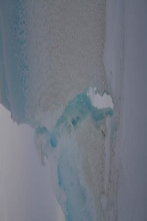 File:Hole in ice wall.JPG